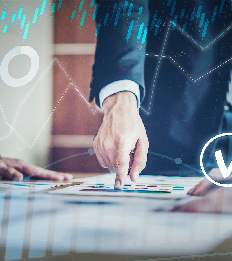 Business analytics displayed beside financial documents